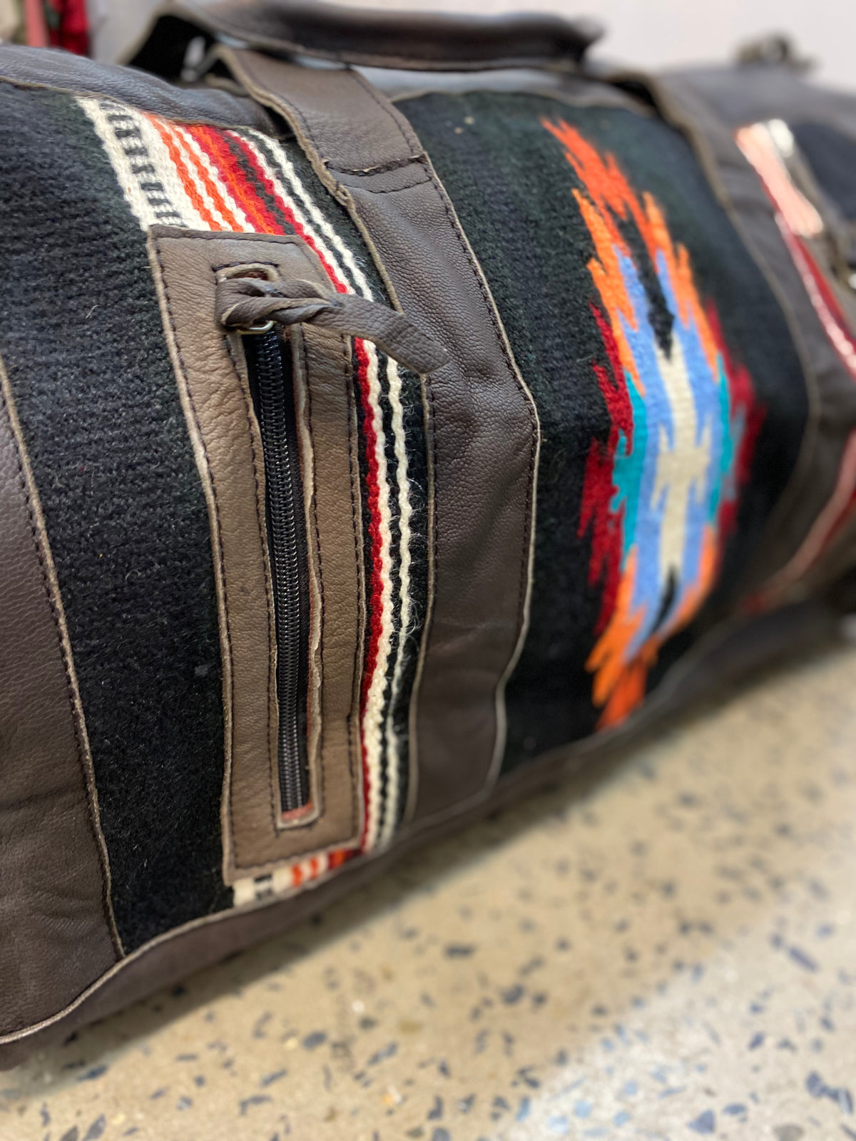 Saddle blanket top duffle bag